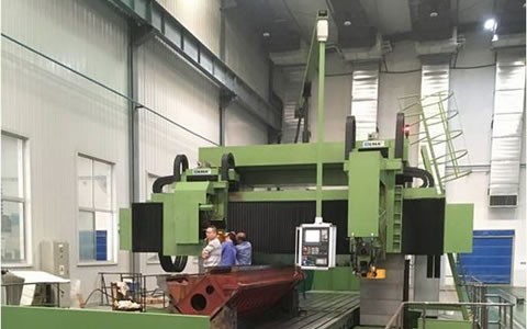 杭(hang)機股份12米大型數(shù)控動梁龍門導軌(gui)磨床順利交付